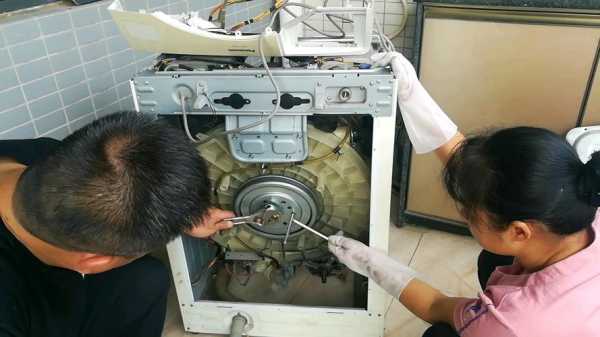 竖桶洗衣机怎么换轴承_洗衣机轴承拆卸